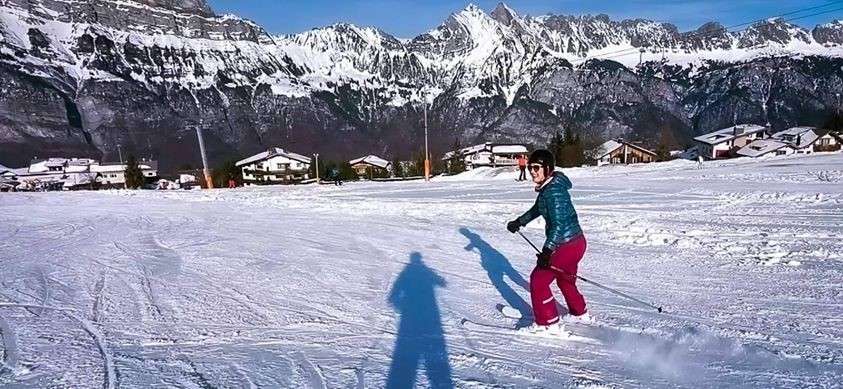 Image may contain: one or more people, snow, sky, mountain, outdoor and nature